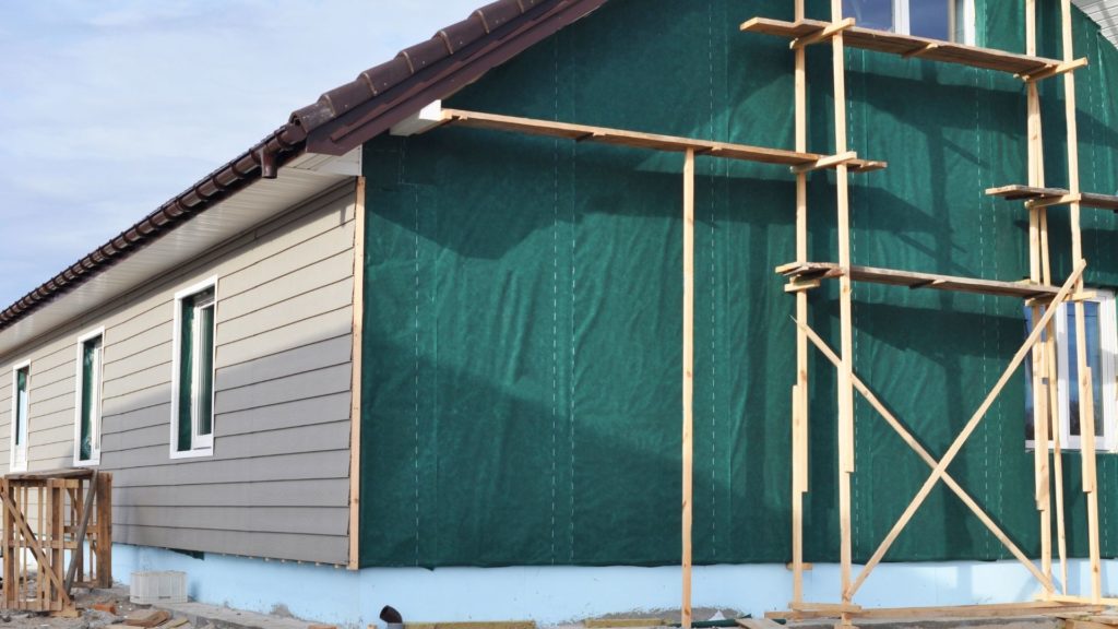 A midsized home goes through siding installation after the homeowner considered the question: What is the best types of siding for your home? 